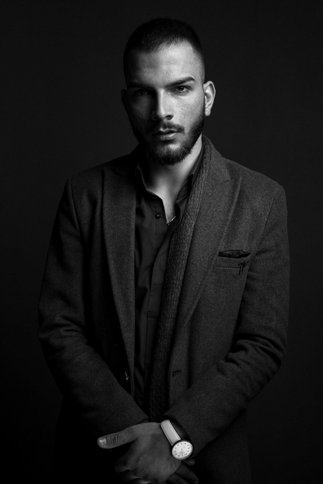 Studio portrait of a middle-aged man in a blazer